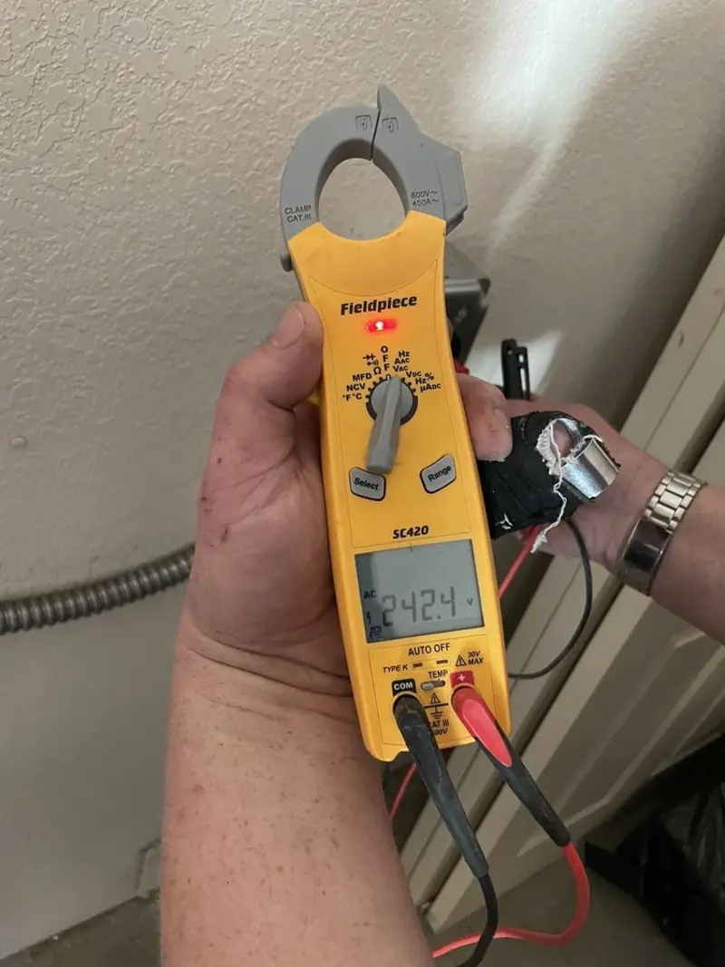 Voltage testing with clamp meter during Generator Installation in Murray